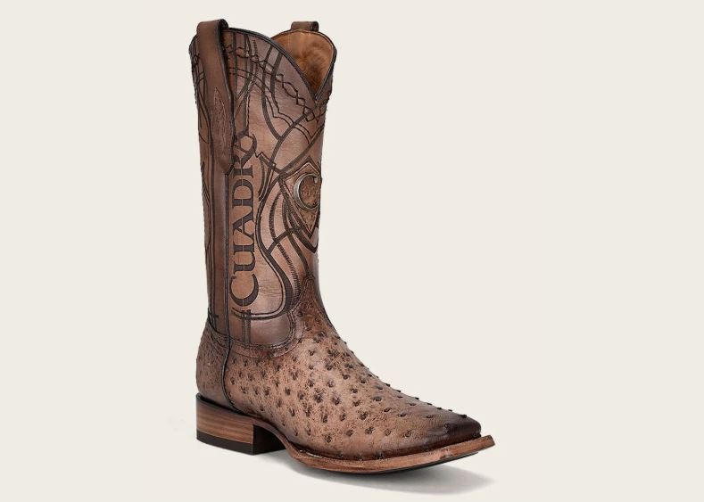 Honey-colored exotic leather boot with embossed details
