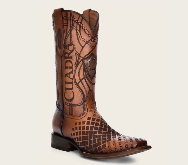 Honey-colored leather cowboy boot with embossing